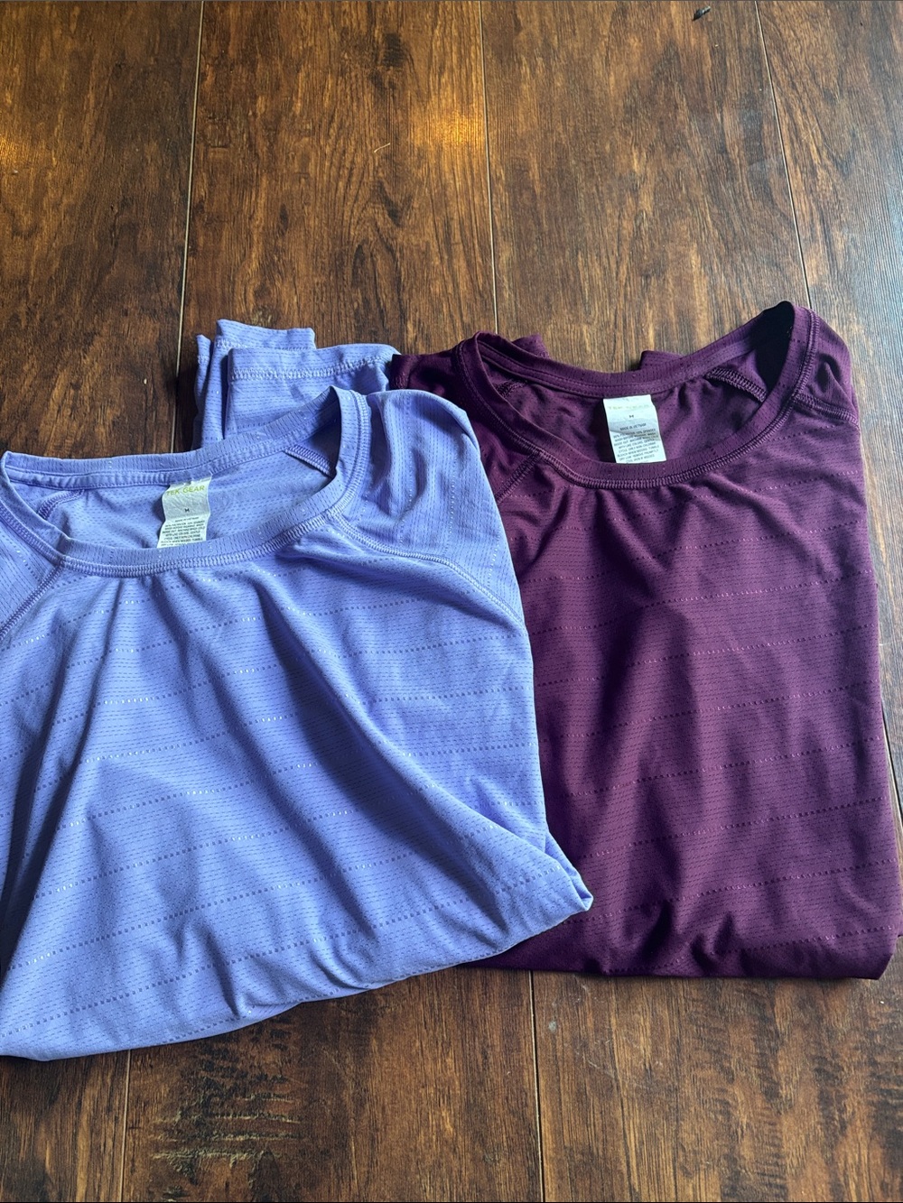 tek gear women’s short sleeve performance tees in lavender and plum